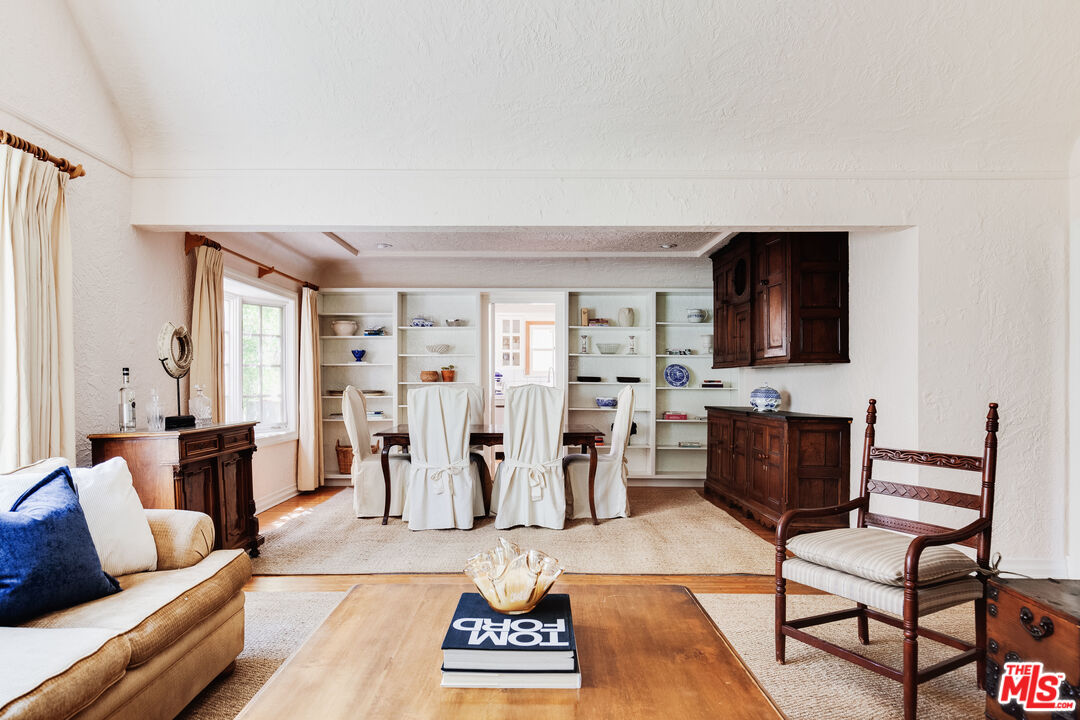 9018 Elevado Avenue West Hollywood, CA 90069 - Photo 10 of 32 a view of living room filled with furniture and window