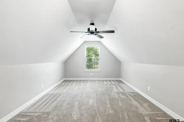 a view of a wooden floor with a bench