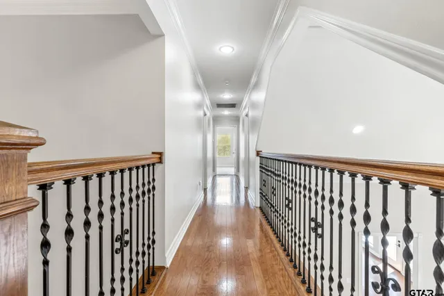 a view of a backyard with a small pool and deck