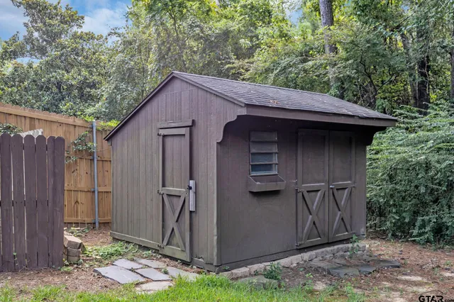 a view of a house with swimming pool