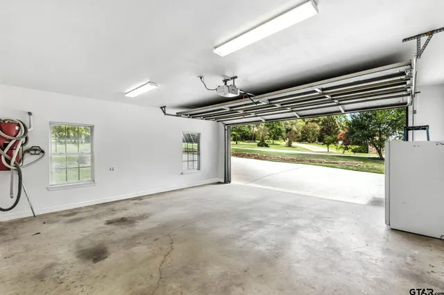 an aerial view of residential house with outdoor space