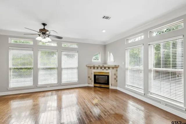 a view of a hallway with staircase