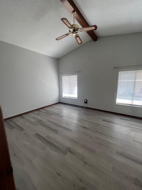 5375 Patricia Place Weeki Wachee, FL 34607 - Photo 25 of 61 a view of a room with wooden floor and windows