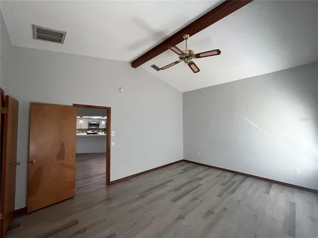 a view of a backyard of the house