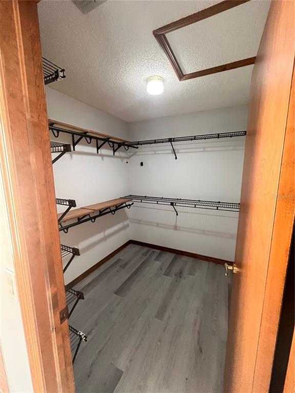 5375 Patricia Place Weeki Wachee, FL 34607 - Photo 30 of 61 a view of a room with racks on the wall