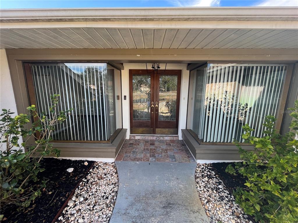 5375 Patricia Place Weeki Wachee, FL 34607 - Photo 5 of 61 a view of a house with a door and wooden floor
