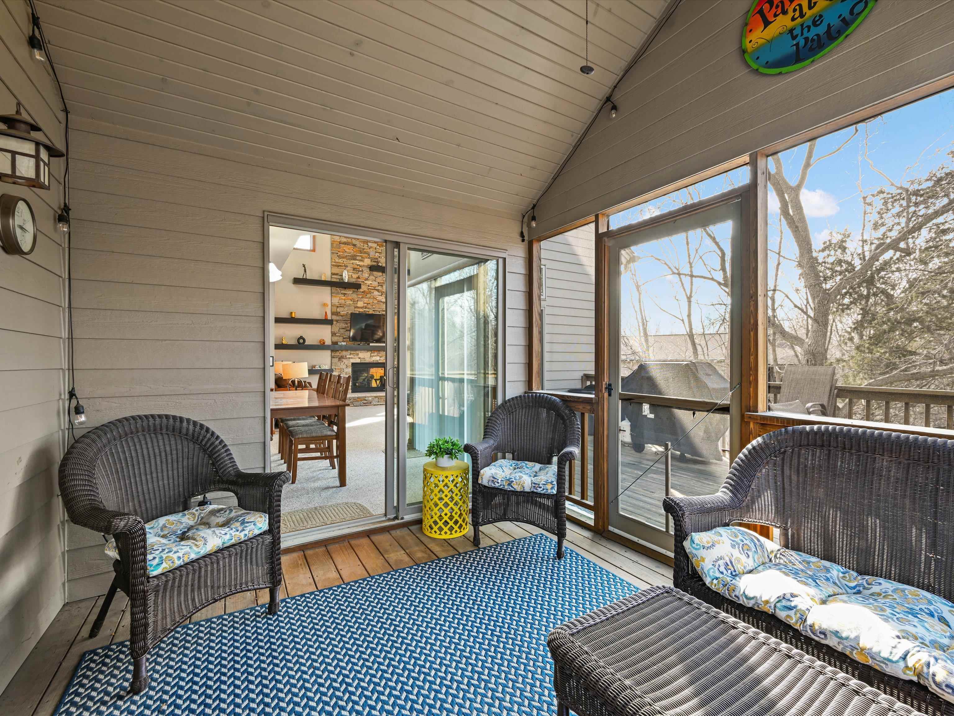 1 High Ridge Run Galena, IL 61036 - Photo 37 of 40 a living room with furniture and a floor to ceiling window