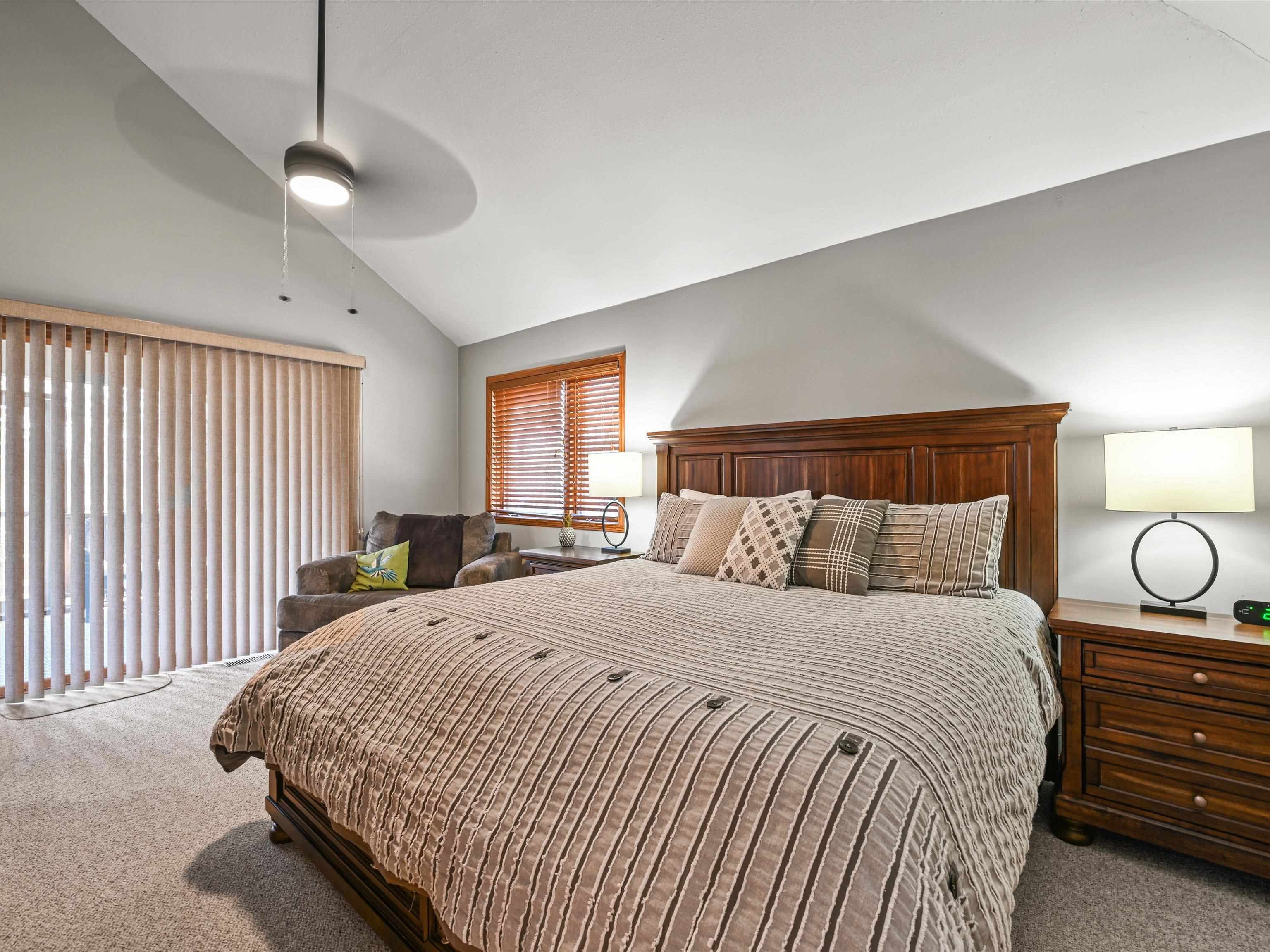 1 High Ridge Run Galena, IL 61036 - Photo 39 of 40 a bedroom with a large bed and a window