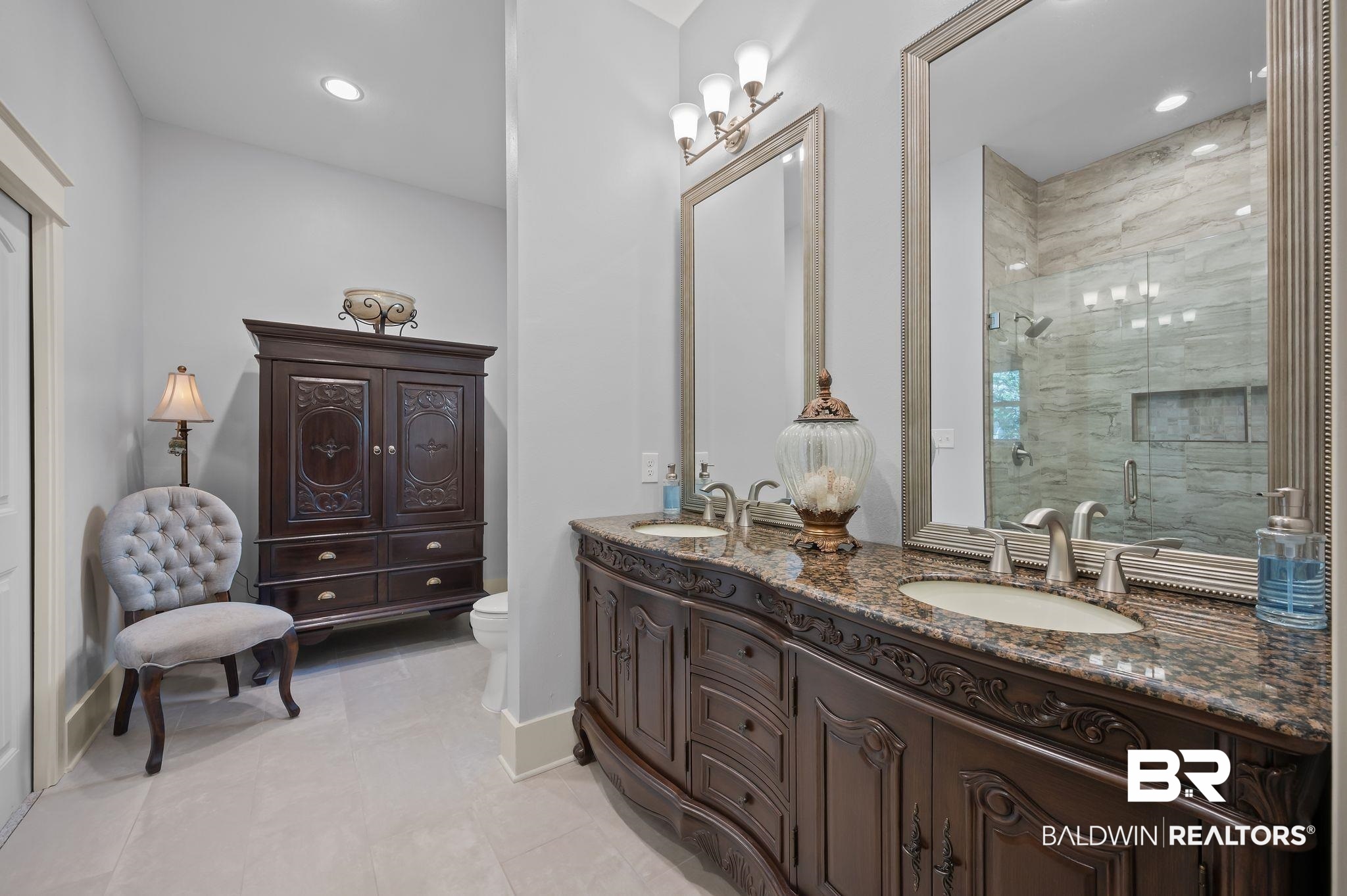 905 Buttercup Lane Foley, AL 36535 - Photo 29 of 47 Full bathroom with double vanity, a shower stall, and recessed lighting