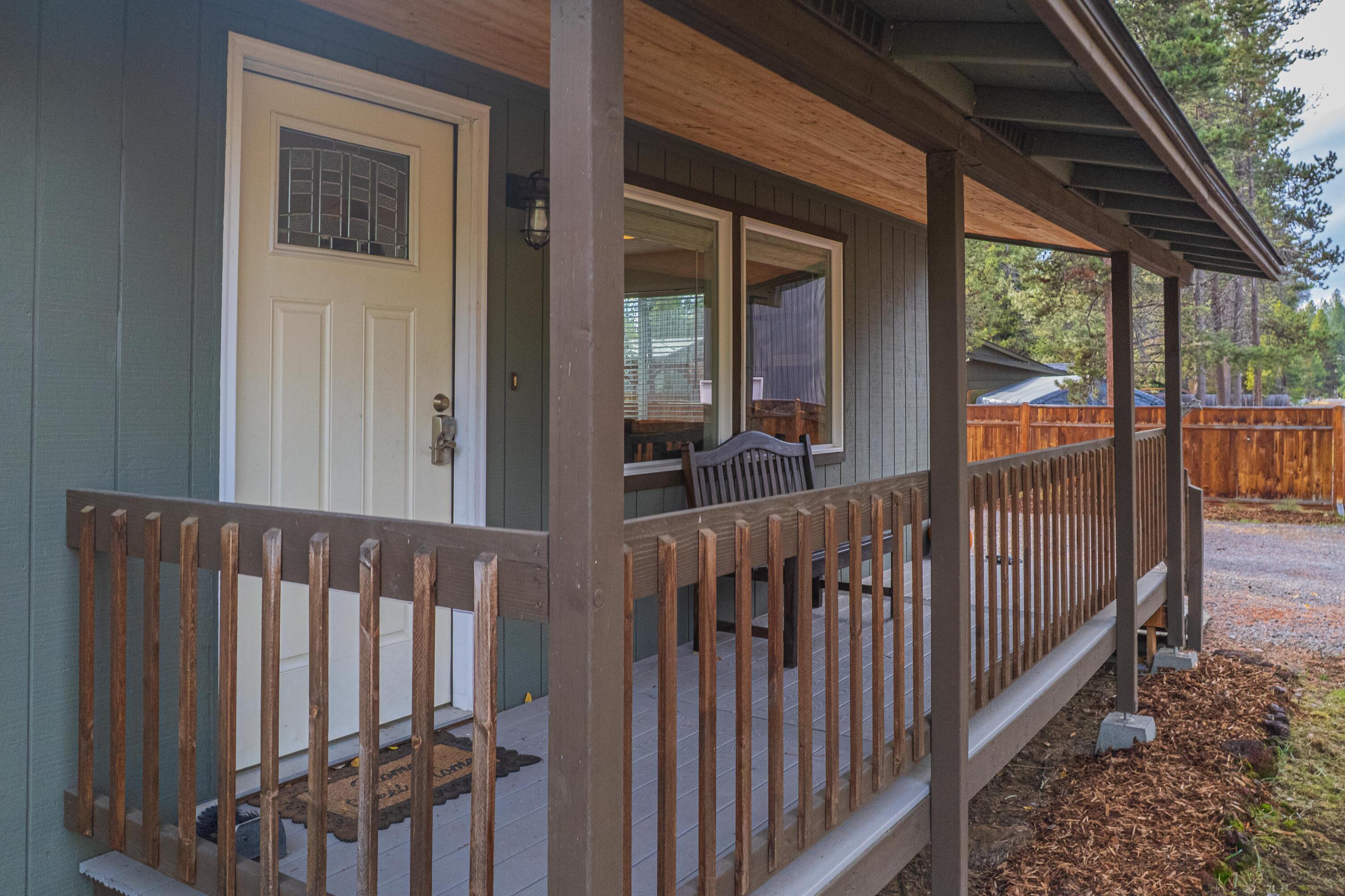 56078 Snow Goose Road Bend, OR 97707 - Photo 4 of 46 A covered front porch welcomes you home.