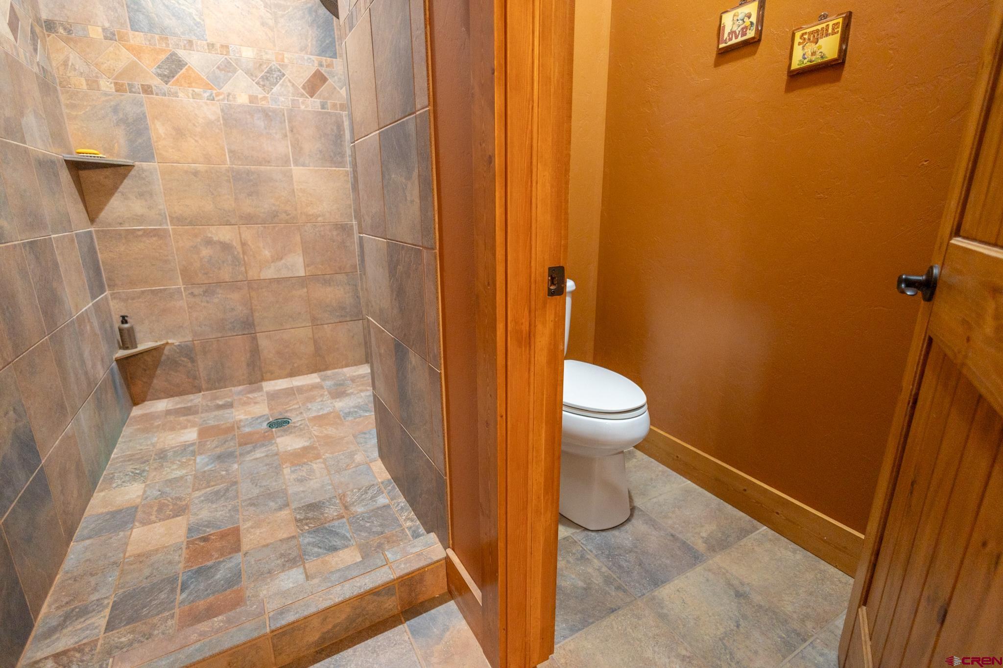 9550 High Mesa Road Olathe, CO 81425 - Photo 16 of 43 a bathroom with a sink and toilet