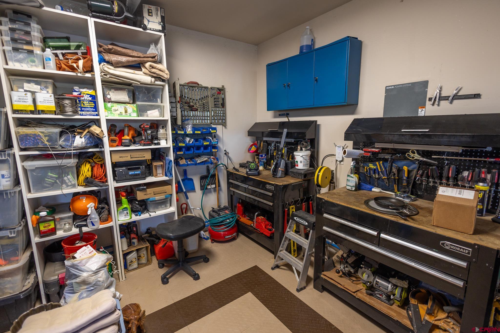 9550 High Mesa Road Olathe, CO 81425 - Photo 28 of 43 a room with storage and utility