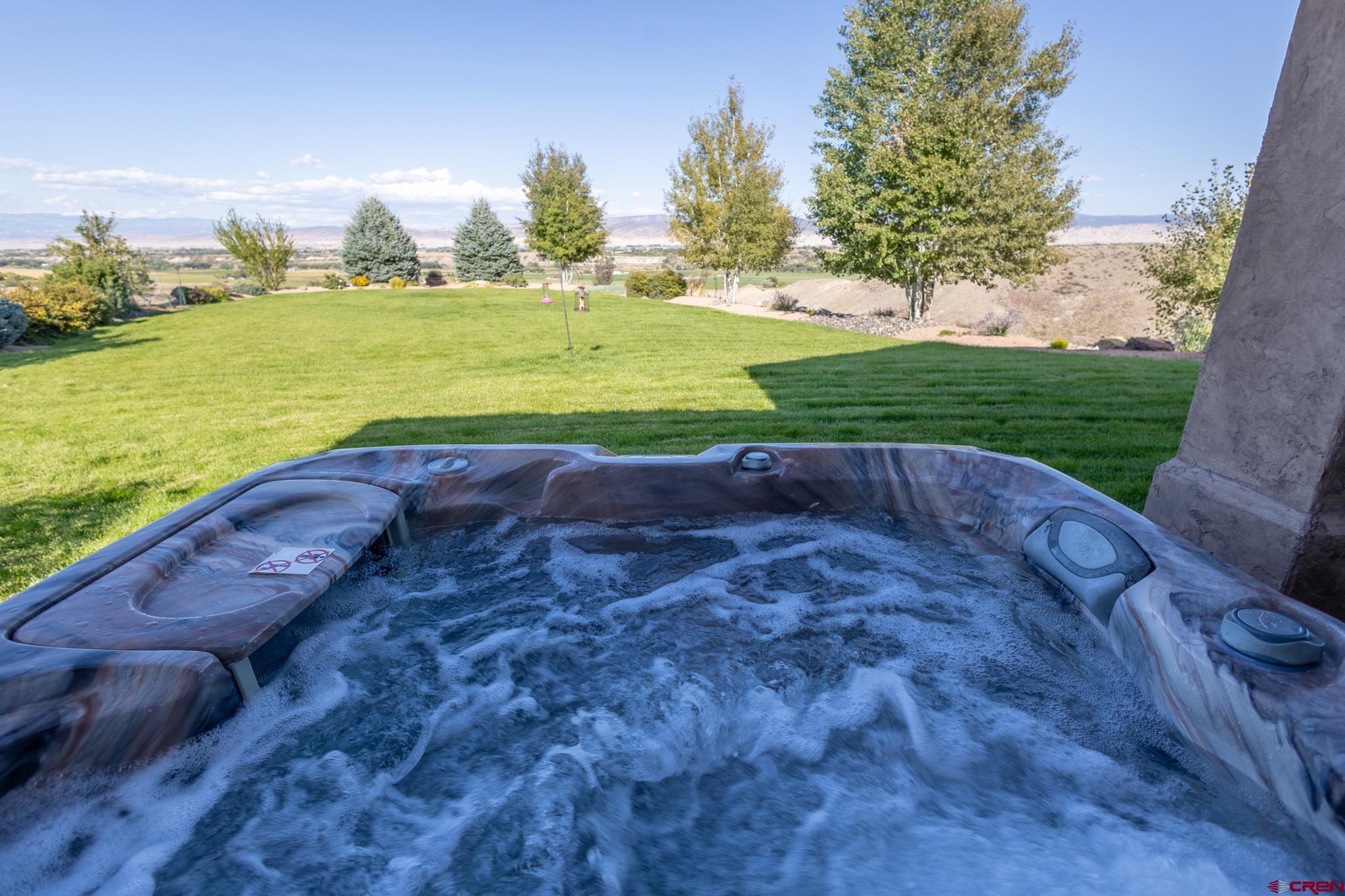 9550 High Mesa Road Olathe, CO 81425 - Photo 37 of 43 a view of a golf course with an ocean