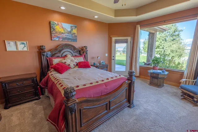 a bed room with a bed and a couch