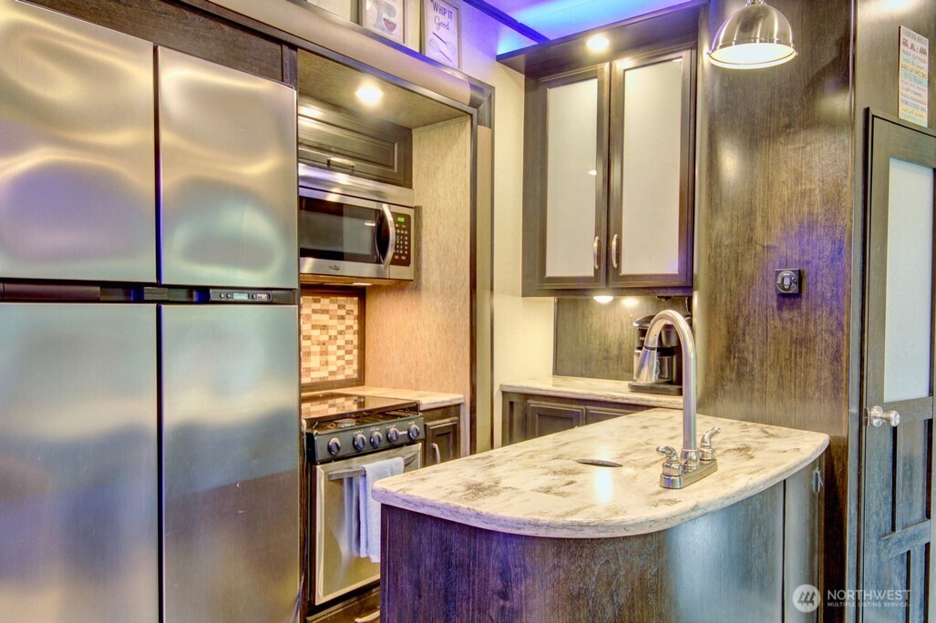 10 Riverside Drive Deming, WA 98244 - Photo 14 of 39 a kitchen with refrigerator and sink