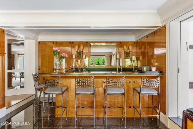 a kitchen with a table and chairs in it