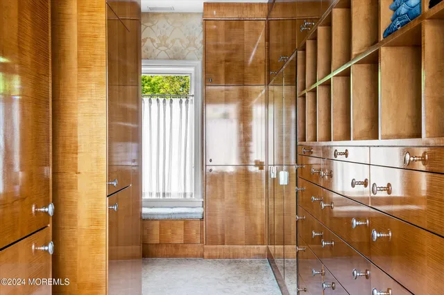 a bathroom with a sink and a shower