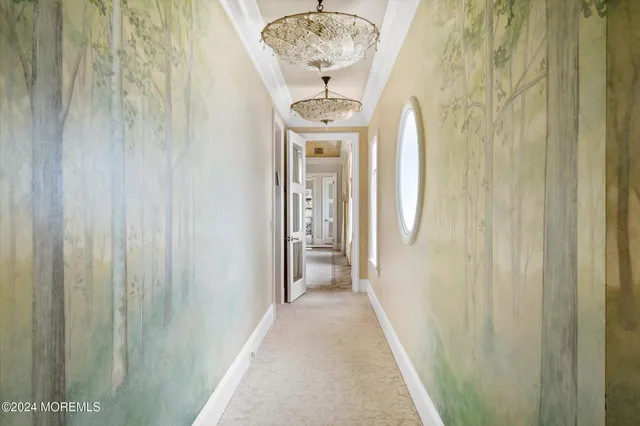 a view of a hallway with a window