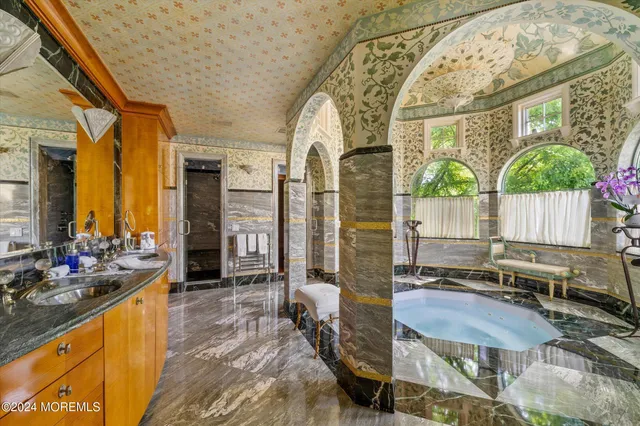 a lobby with furniture and window