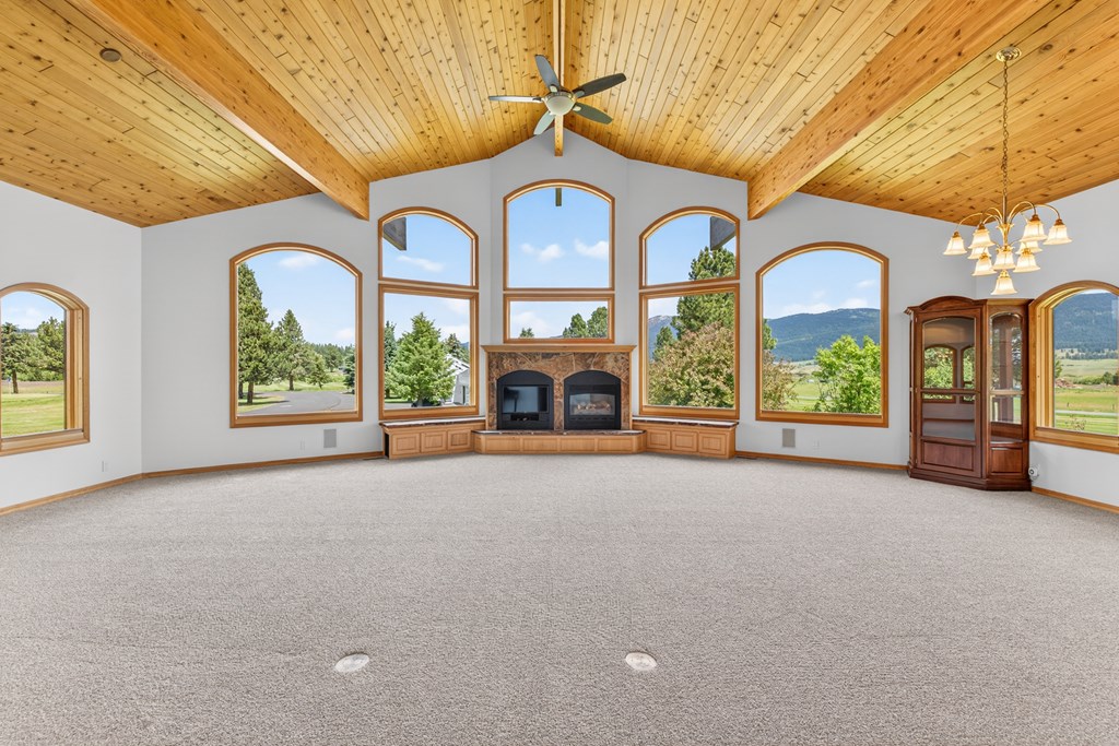 1999 Vardon Road New Meadows, ID 83654 - Photo 5 of 46 Living Room/propane fireplace/TV, Beautiful wood ceiling