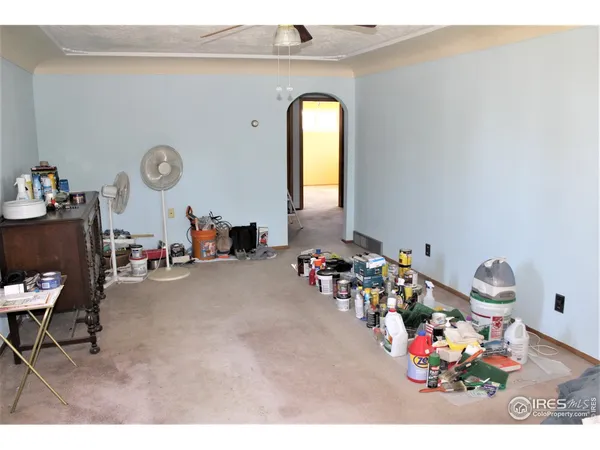 a picture of a room with a floor to ceiling window