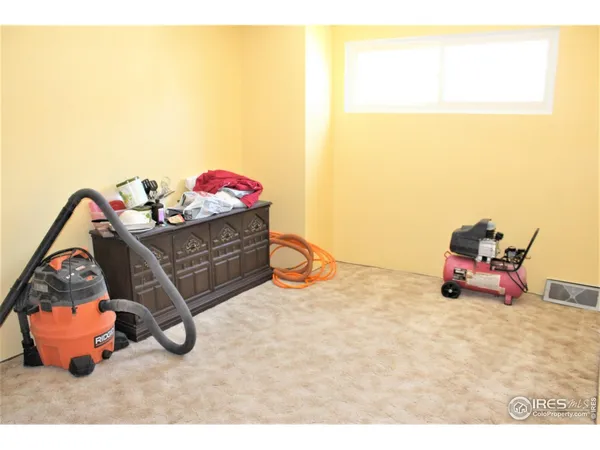 a bedroom with a bed