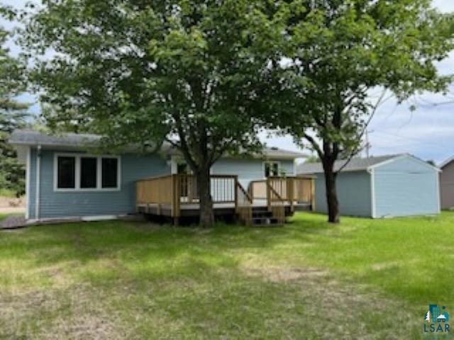 4207 Trinity Road Duluth, MN 55811 - Photo 4 of 40 Rear view of house with a wooden deck and a lawn