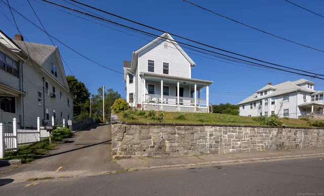 front view of a house with a small yard