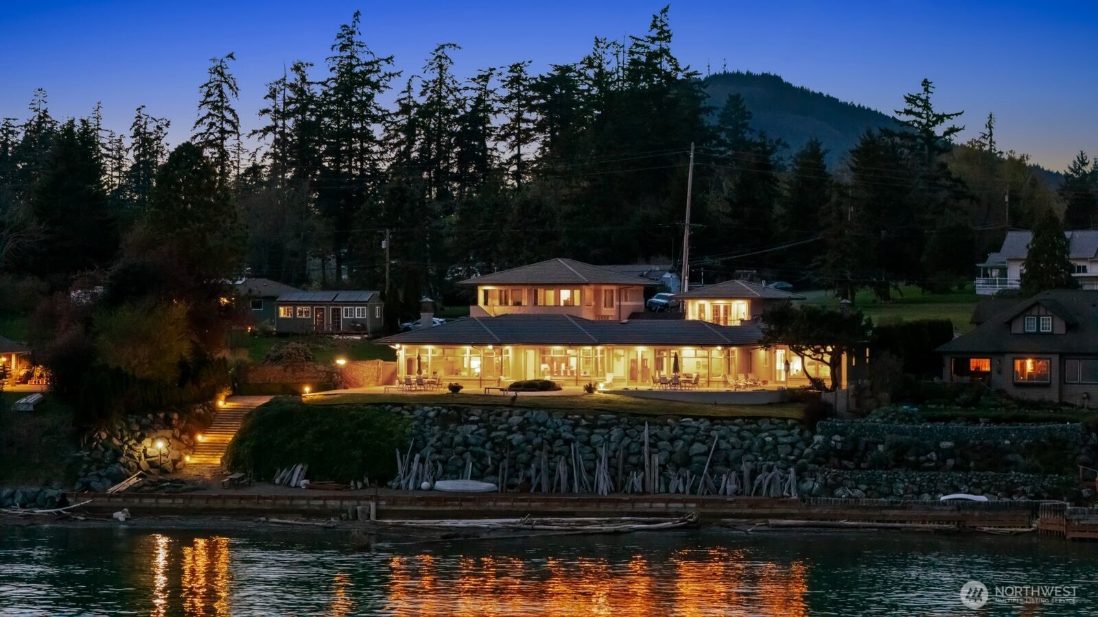15283 Gibralter Road Anacortes, WA 98221 - Photo 2 of 40 a view of swimming pool from a lake view