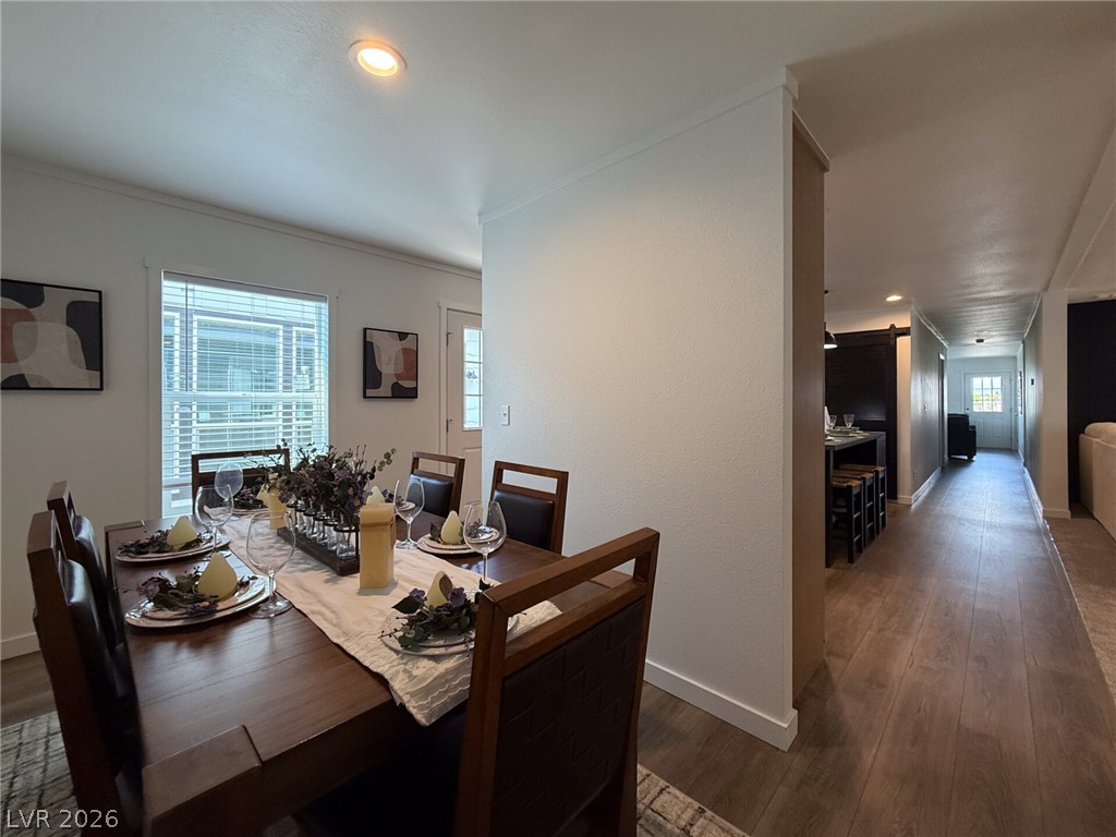 464 Box Canyon Road Alamo, NV 89001 - Photo 21 of 48 Rich wood-look flooring guides the eye through this seamlessly integrated open living design.