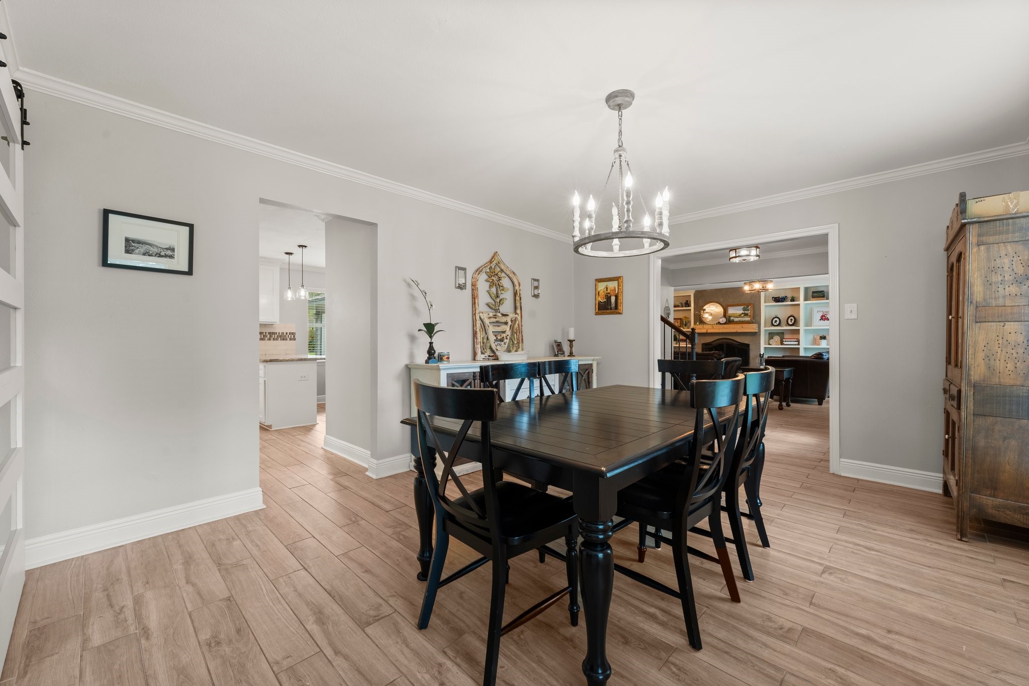 6030 Craigway Road Spring, TX 77389 - Photo 14 of 45 The dining room opens to the kitchen and the living area, offering a spacious and inviting atmosphere.
