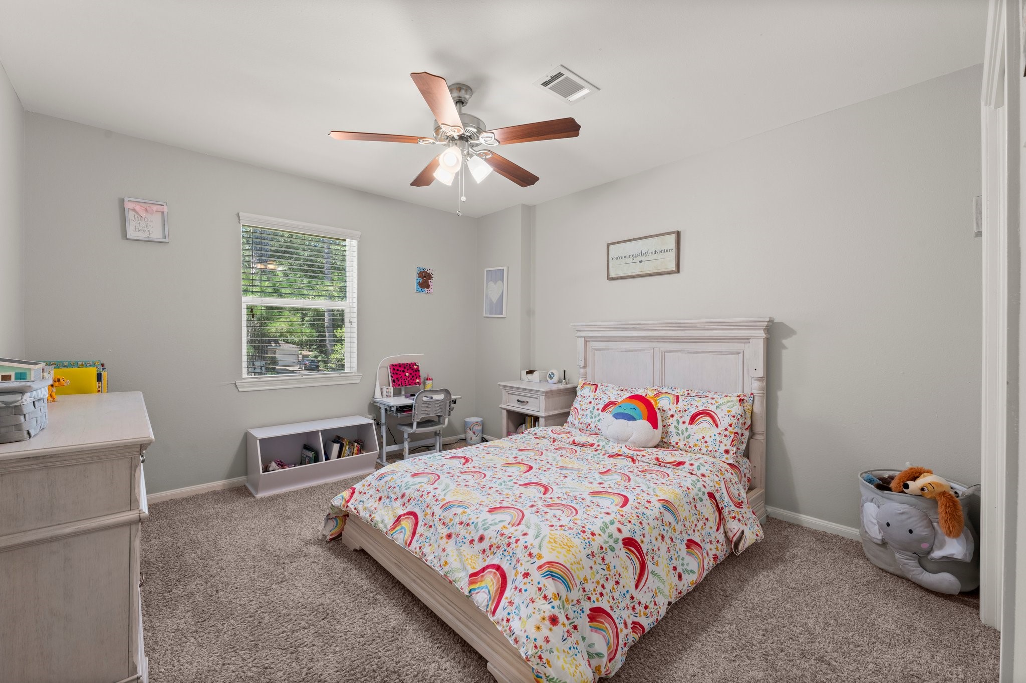 6030 Craigway Road Spring, TX 77389 - Photo 30 of 45 This cozy bedroom features a ceiling fan, and plush carpet. It includes a window to allow plenty natural light.