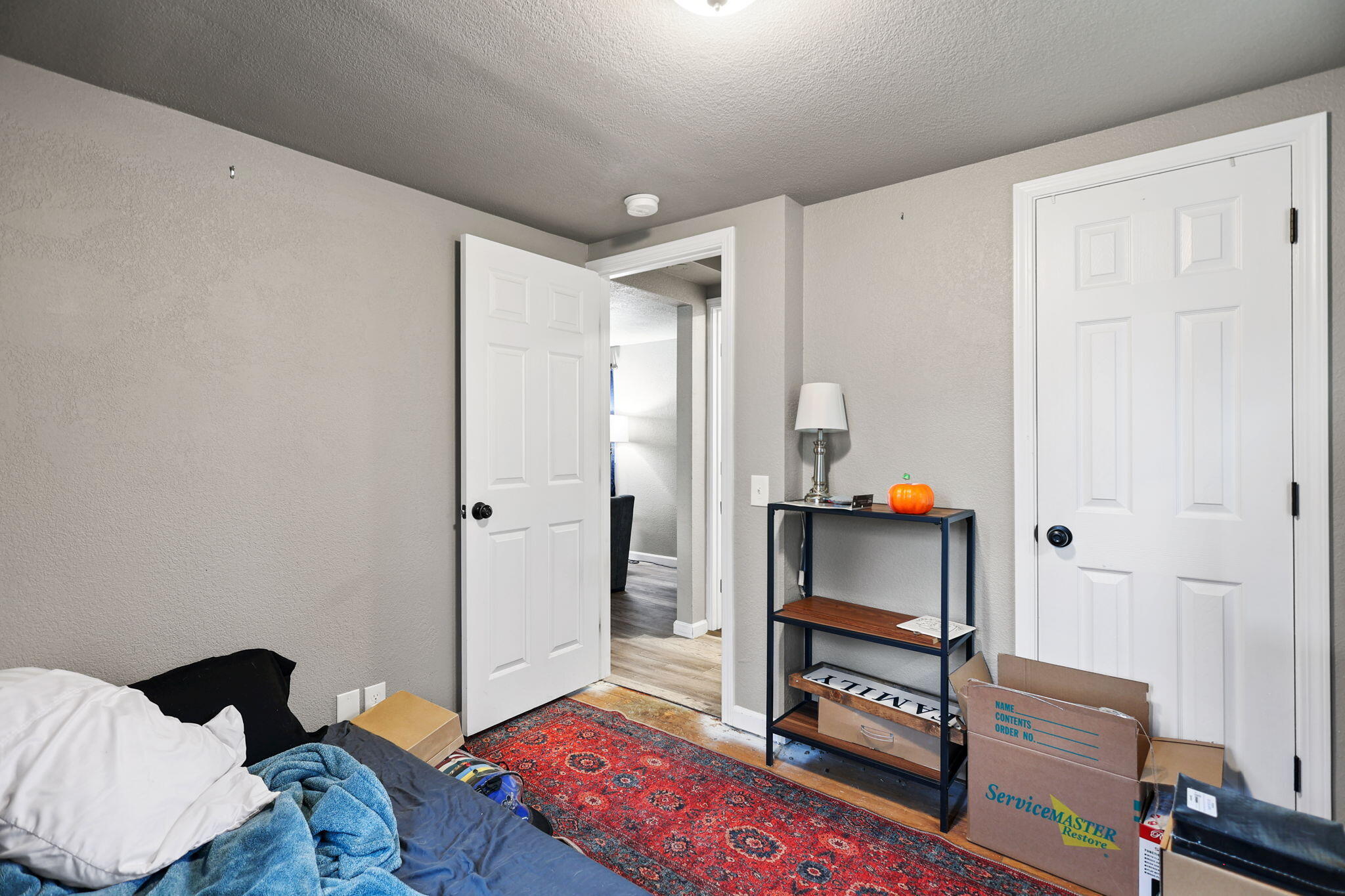 7696 Happy Valley Road Anderson, CA 96007 - Photo 14 of 24 a bedroom with furniture and a window