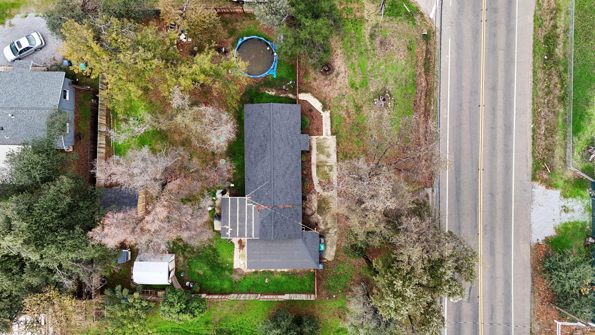 7696 Happy Valley Road Anderson, CA 96007 - Photo 24 of 24 an aerial view of a house with outdoor space