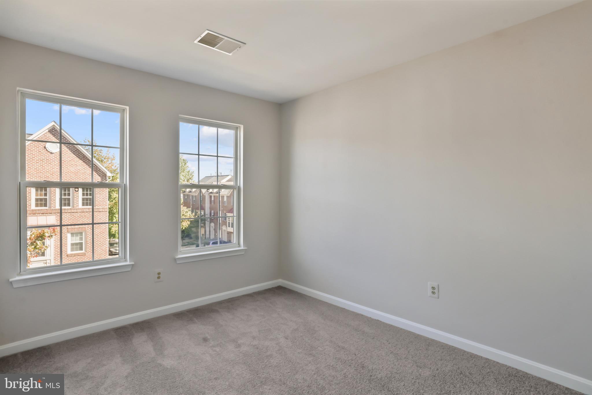 1802 Spanish Oak Lane Bowie, MD 20721 - Photo 20 of 53 an empty room with windows