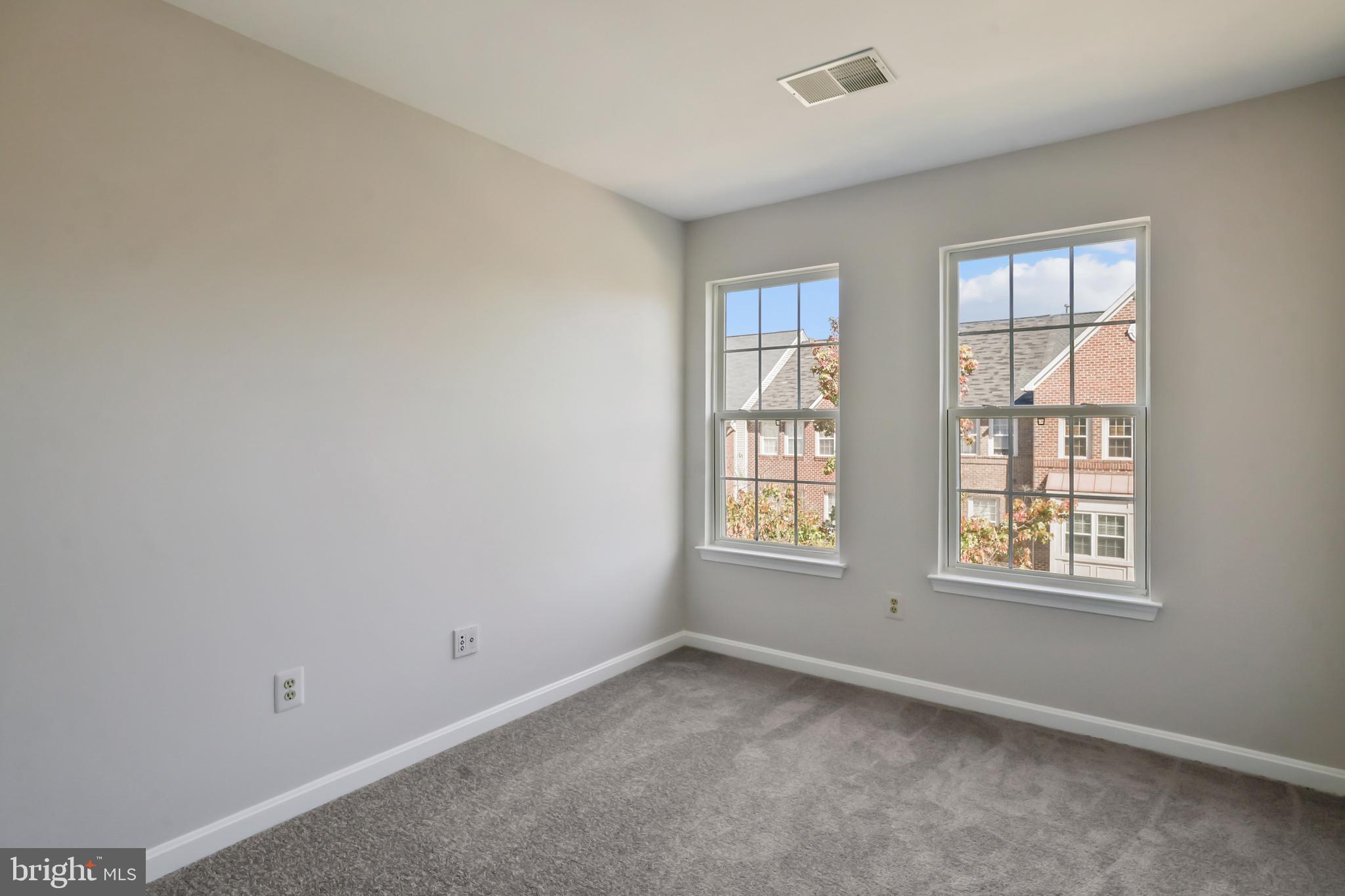 1802 Spanish Oak Lane Bowie, MD 20721 - Photo 22 of 53 a view of an empty room with a window