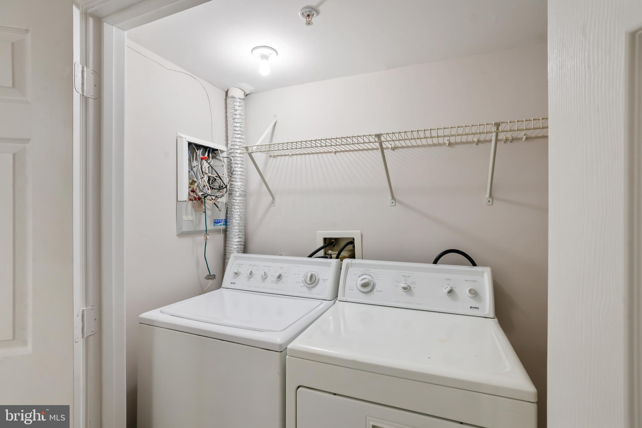 1802 Spanish Oak Lane Bowie, MD 20721 - Photo 30 of 53 a utility room with dryer and washer