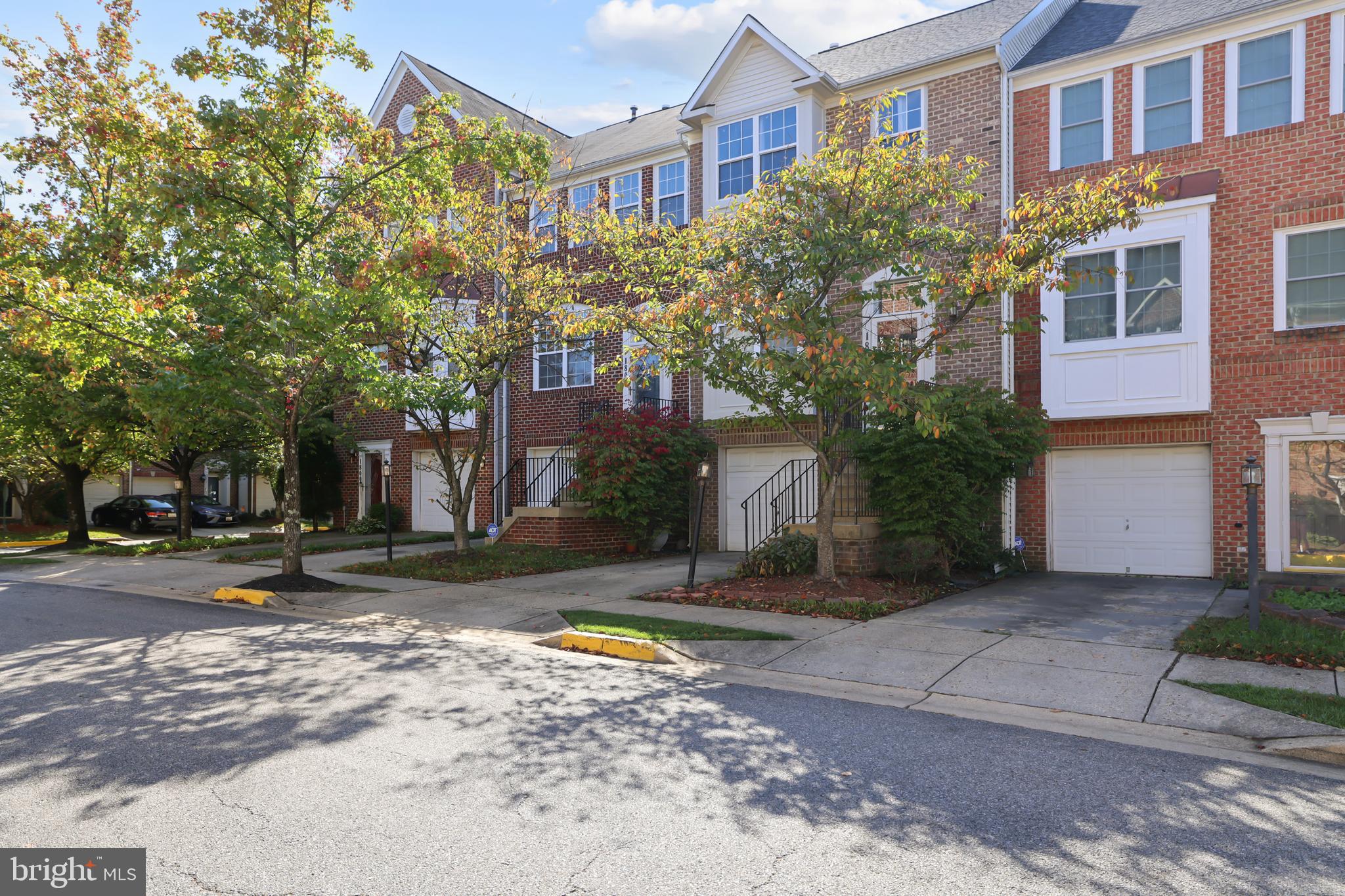1802 Spanish Oak Lane Bowie, MD 20721 - Photo 39 of 53 a view of a house with a yard and large tree