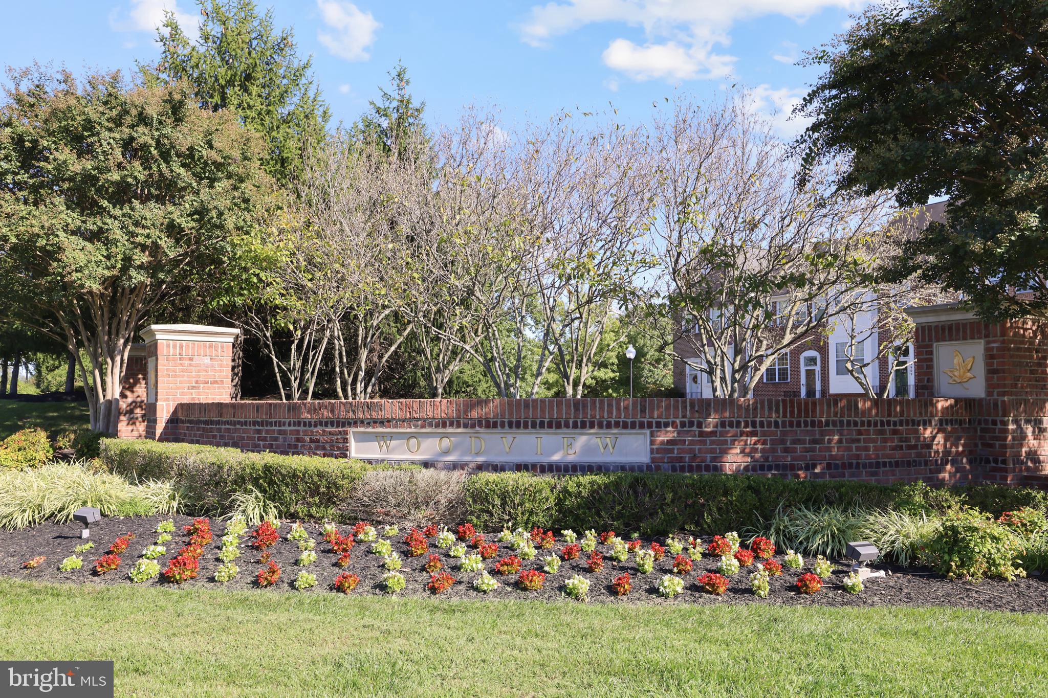 1802 Spanish Oak Lane Bowie, MD 20721 - Photo 41 of 53 a view of a house with a yard and potted plants