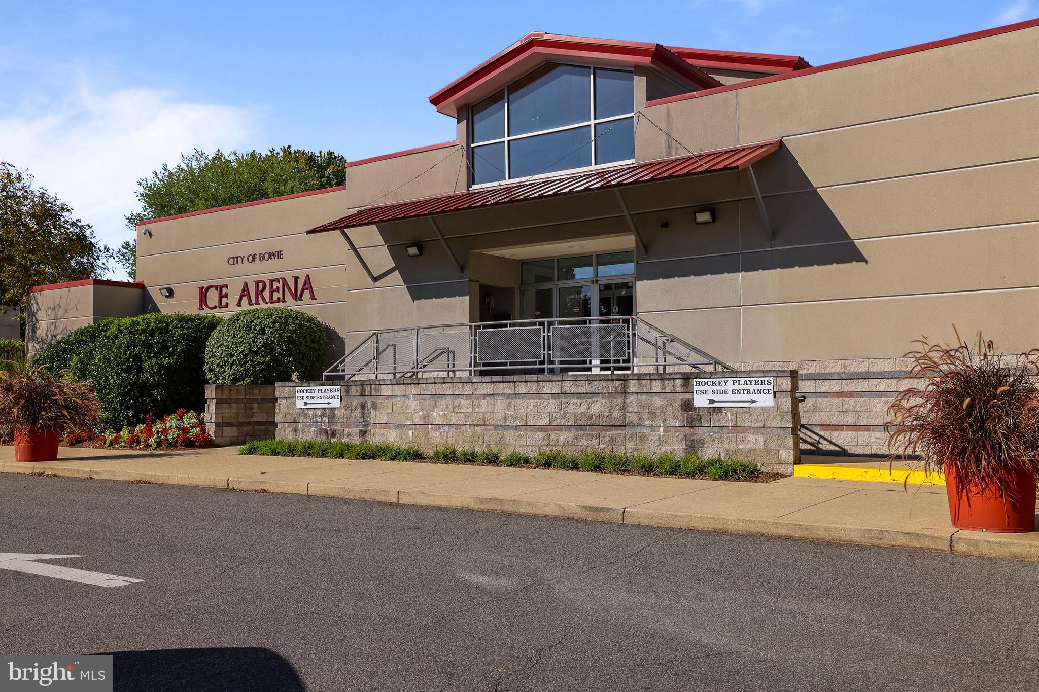 1802 Spanish Oak Lane Bowie, MD 20721 - Photo 48 of 53 a front view of a house with a yard