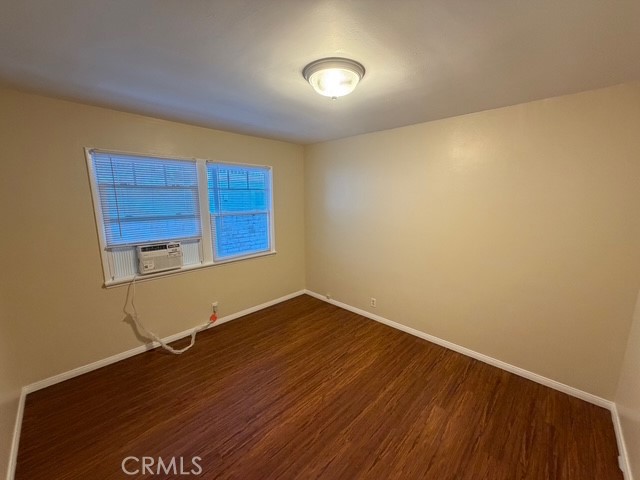25 Genoa Street, Unit D Arcadia, CA 91006 - Photo 13 of 18 a view of a room with wooden floor and a window