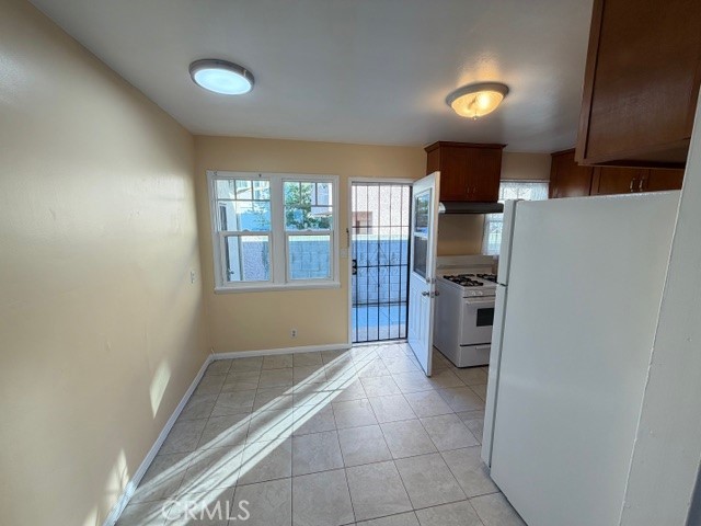 25 Genoa Street, Unit D Arcadia, CA 91006 - Photo 7 of 22 a kitchen with stainless steel appliances a refrigerator and a stove