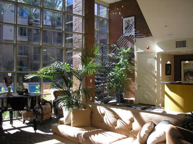 1701 East Colter Street, Unit 239 Phoenix, AZ 85016 - Photo 3 of 20 Clubhouse Atrium & Piano