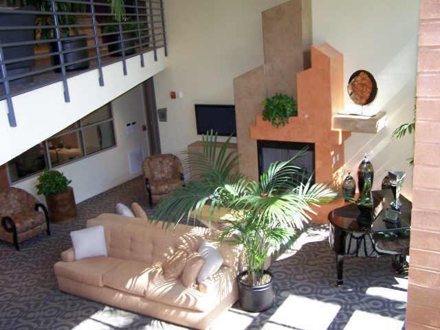 1701 East Colter Street, Unit 239 Phoenix, AZ 85016 - Photo 4 of 20 Clubhouse Fireplace