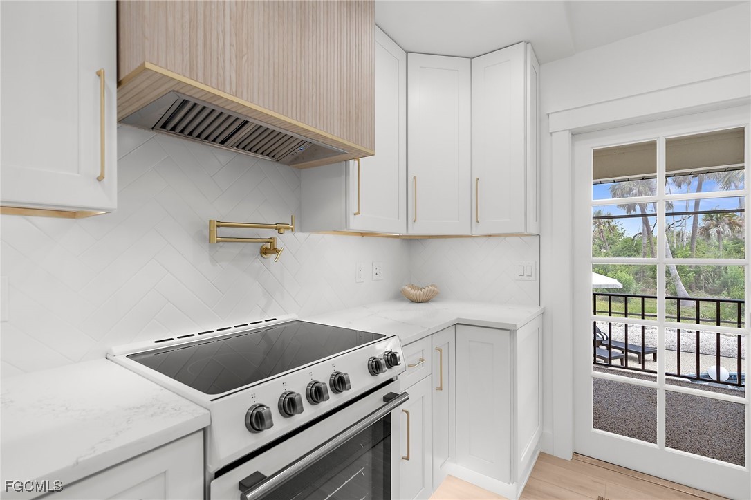 13270 Electron Drive Fort Myers, FL 33908 - Photo 15 of 47 a utility room with dryer and cabinets