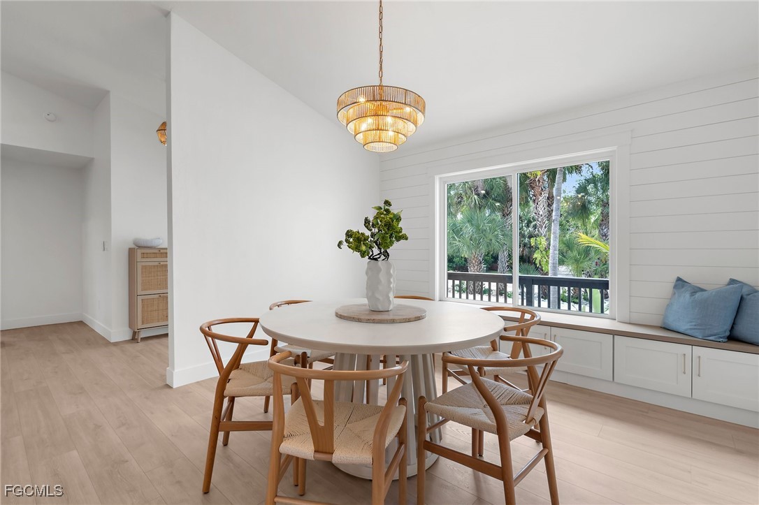 13270 Electron Drive Fort Myers, FL 33908 - Photo 18 of 47 a dining room with furniture and a window