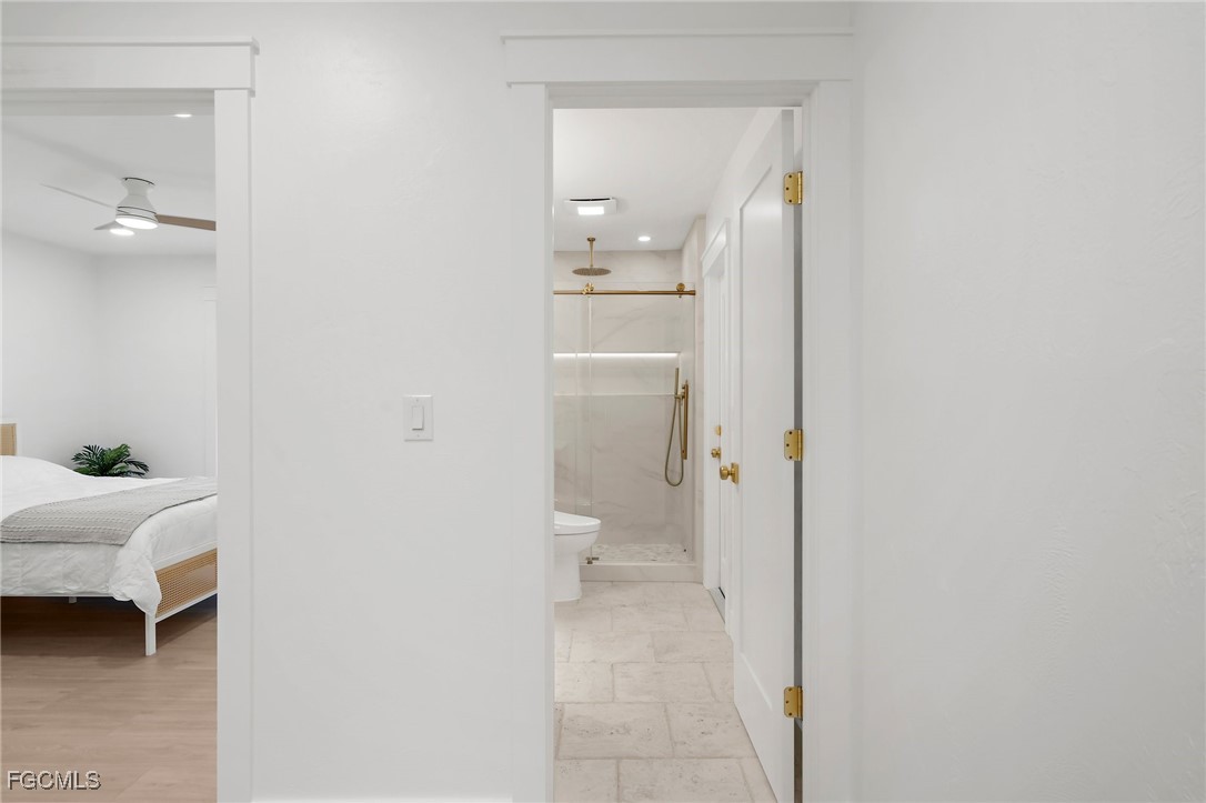 13270 Electron Drive Fort Myers, FL 33908 - Photo 23 of 47 a bathroom with a sink and a toilet