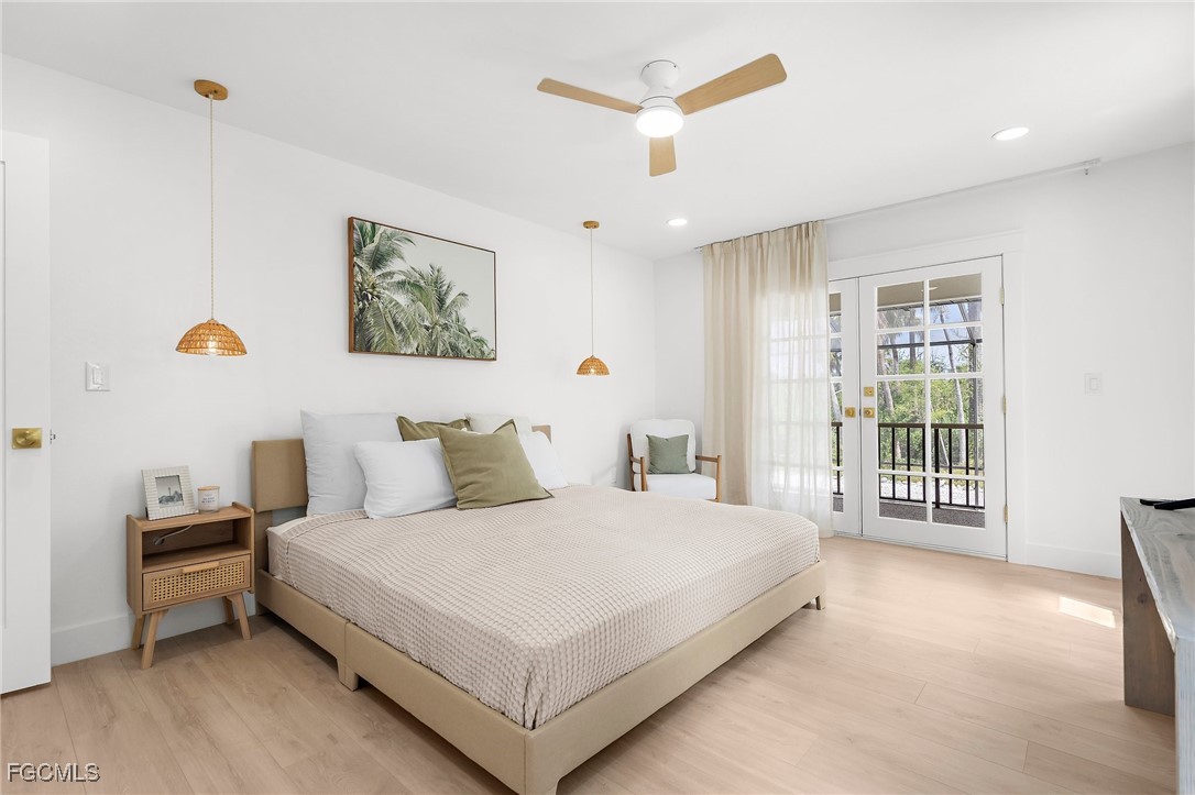 13270 Electron Drive Fort Myers, FL 33908 - Photo 26 of 47 a bedroom with a large bed and a window