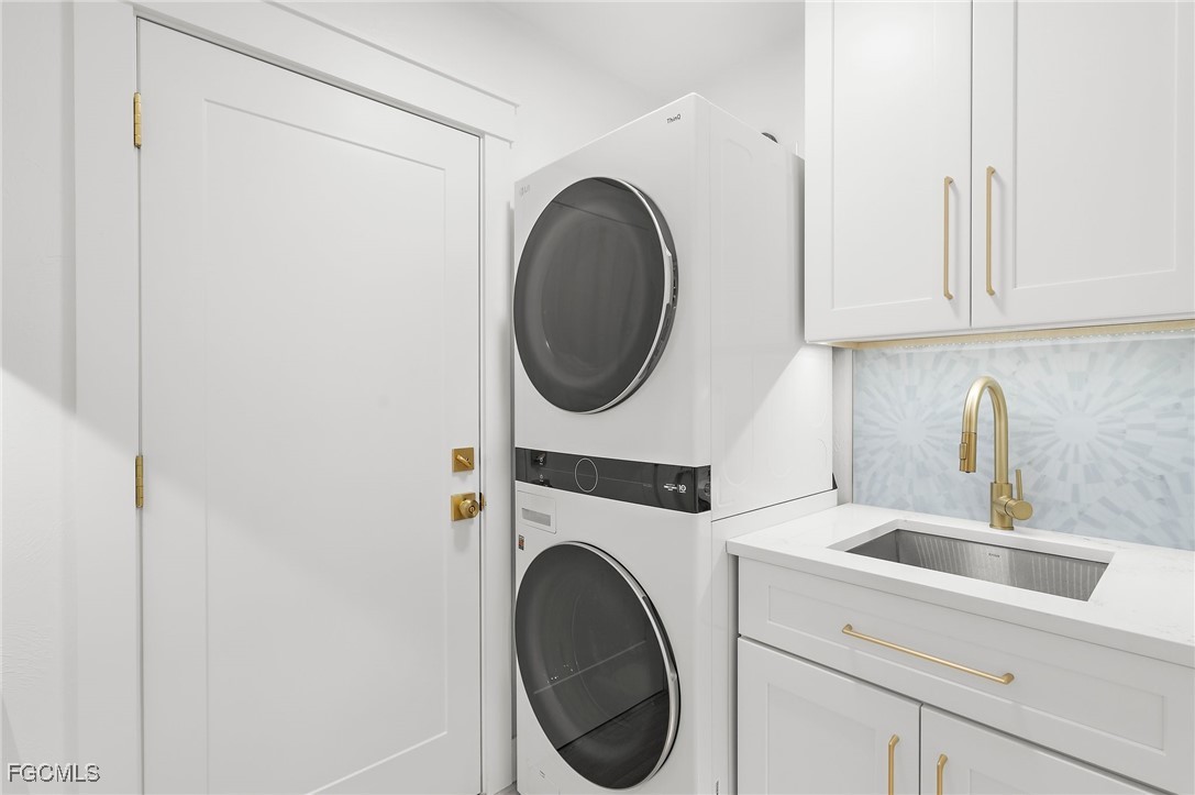 13270 Electron Drive Fort Myers, FL 33908 - Photo 33 of 47 a utility room with dryer and washer
