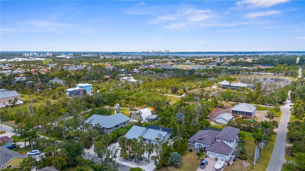 13270 Electron Drive Fort Myers, FL 33908 - Photo 44 of 47 an aerial view of residential house with outdoor space and lake view in back